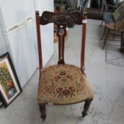 A mahogany nursing chair