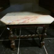 A marble topped barley twist stool