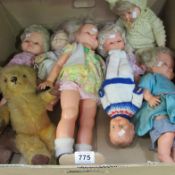 A box of vintage dolls and bears