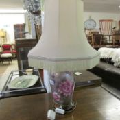 An urn style table lamp