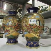 A pair of Japanese vases