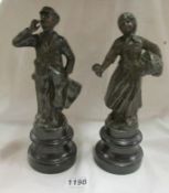 A pair of spelter street vendors (flower girl and newsboy)