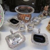 A silver plate 6 piece condiment set and a jardiniere