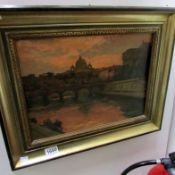A gilt framed oil on board bridge over river scene