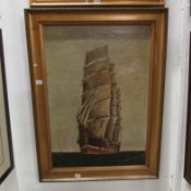 A large old gilt framed oil on canvas of a triple mast tall ship