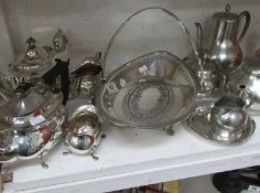 A silver plate tea set, pewter tea set and silver plate basket