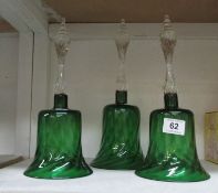 3 green glass bells