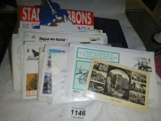 A collection of first day covers, postcards, blank album etc