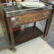 An oak 2 drawer tea trolley with chromed gallery & 2 drawers of cutlery