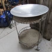 A wrought iron tea trolley