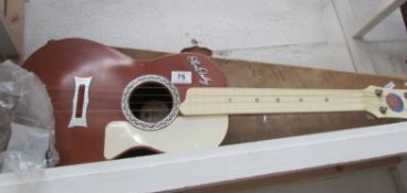 A 1960's plastic 'Elvis Presley' guitar by Selcol