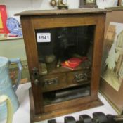 An oak smoker's cabinet