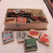 A collection of match box covers