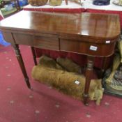 A Victorian mahogany fold over table