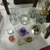 A mixed lot of glass paperweights