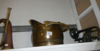 A brass coal scuttle, a bugle and a cornet