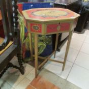 A hand painted sewing table