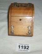 An inkwell in the shape of a coal box