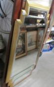 A gilt framed mirror