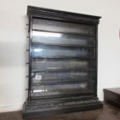 A glazed specimen cabinet