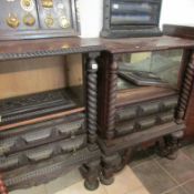 A pair of early carved wall cabinets for restoration