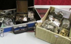 A case and a box of assorted coins