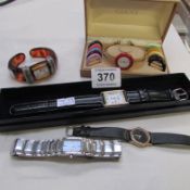 5 watches including Gucci