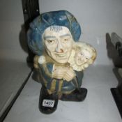 A cast iron Punch and Judy doorstop