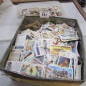 2 boxes of loose cigarette and tea cards