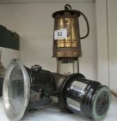A carbide lamp and a Washington Newtown miner's lamp