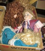 A box of porcelain dolls