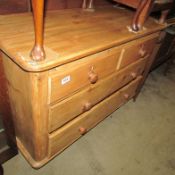 A pine 2 over 2 chest of drawers