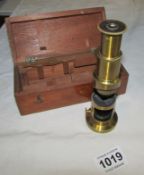A cased brass travelling microscope