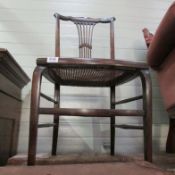 A mahogany cane seated bedroom chair