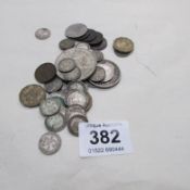 A quantity of coins including British silver