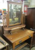 A satin walnut dressing table