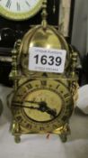 A brass Smith's lantern clock