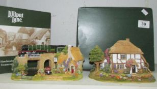 2 boxed Lilliput Lane cottages being 'The Flying Scotsman' and 'Through the Keyhole'
