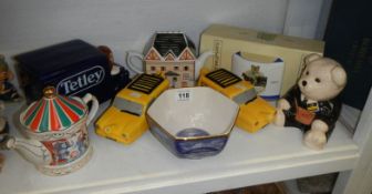 A quantity of novelty teapots, Rington's dish and Teddy bank