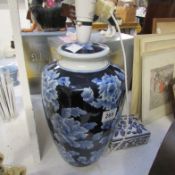 A blue and white lamp base and a trinket pot