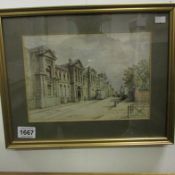 A framed and glazed watercolour of a town scene signed Allan