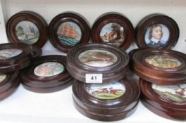 14 framed pot lids depicting animals, ships etc