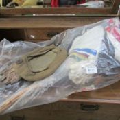 A quantity of bunting, leather gloves, beret etc