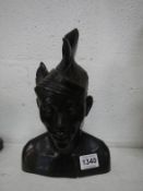A carved 'Balinese' bust (slight a/f)