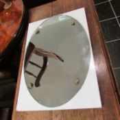 An original Pullman monogrammed oval railway mirror