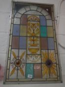 A leaded and stained glass panel