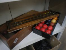 A snooker score board and balls