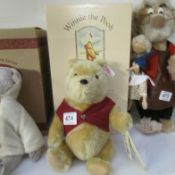 A boxed Steiff Winnie the Pooh bear