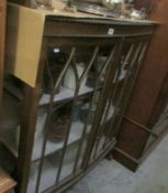 A mahogany display cabinet