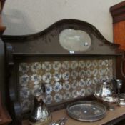 A tiled wash stand back